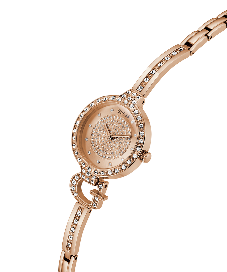 GUESS Ladies Rose Gold Tone Analog Watch with diamond-studded strap on a white background lifestyle