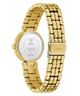 GUESS Ladies Gold Tone Analog Watch caseback with a white face on a white background