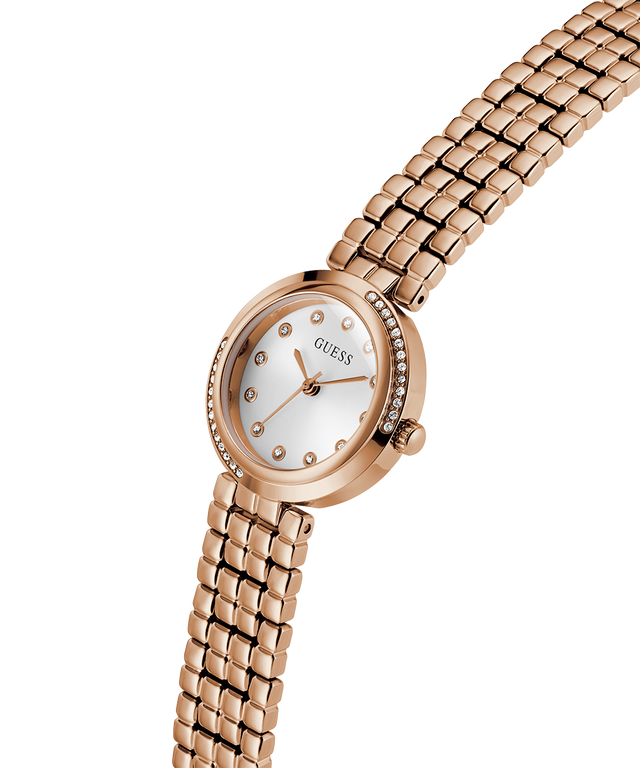 GUESS Ladies Rose Gold Tone Analog Watch with a white face on a white background lifestyle