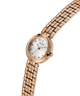 GUESS Ladies Rose Gold Tone Analog Watch with a white face on a white background lifestyle