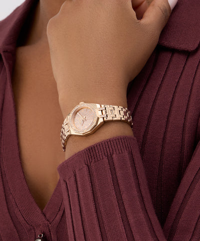 GUESS Ladies Rose Gold Tone Analog Watch GW0931L4 on wrist