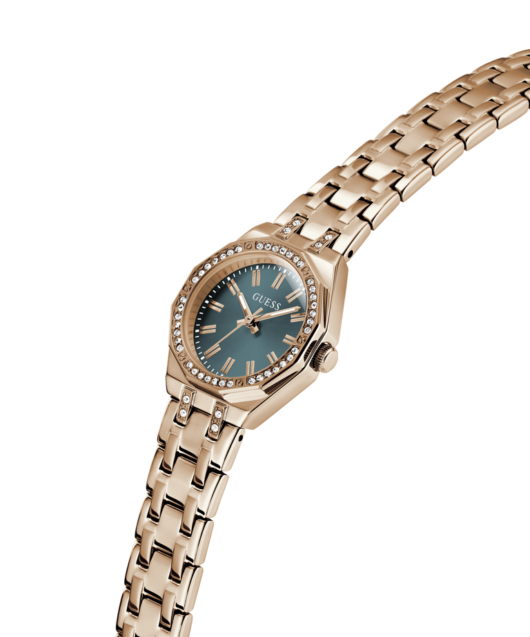 Gold watch with a blue face on a white background lifestyle