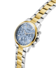 Two-tone gold and silver watch with a detailed face on a white background lifestyle