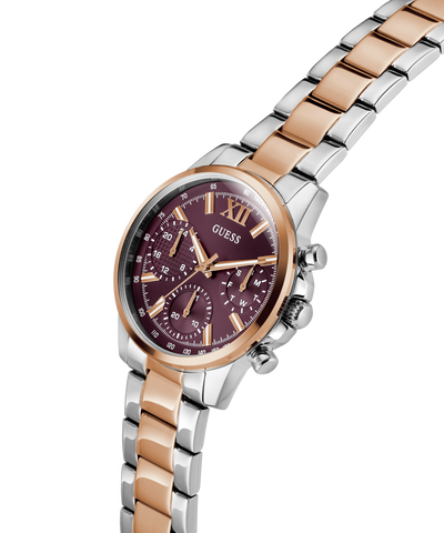GUESS Ladies 2-Tone Multi-function Watch with a cherry face on a white background lifestyle