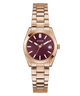GUESS Ladies Rose Gold Tone Date Watch with a maroon face on a white background
