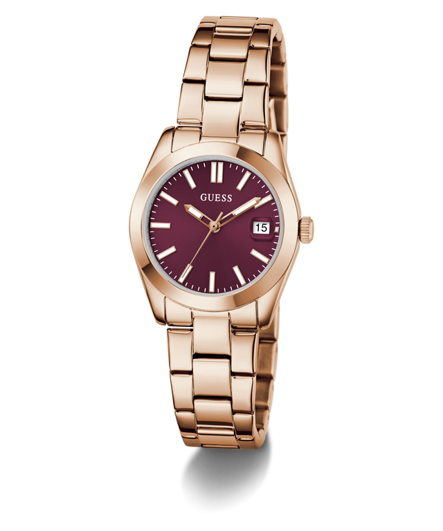 GUESS Ladies Rose Gold Tone Date Watch with a deep red face on a white background