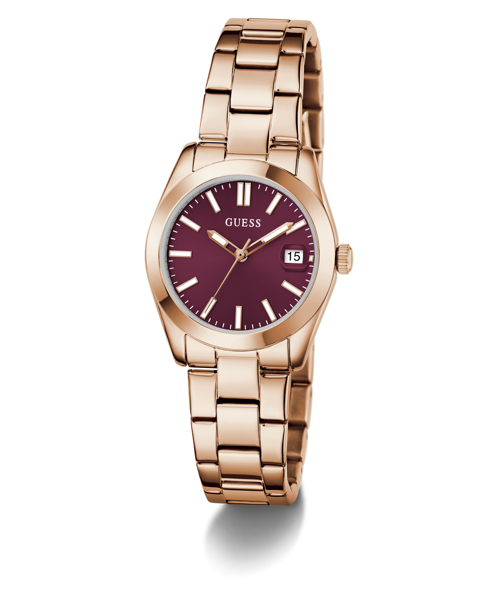 GUESS Ladies Rose Gold Tone Date Watch with a deep red face on a white background