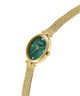 GUESS Ladies Gold Tone Analog Watch with a green face on a white background lifestyle