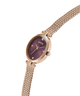GUESS Ladies Rose Gold Tone Analog Watch with a burgundy face on a white background lifestyle