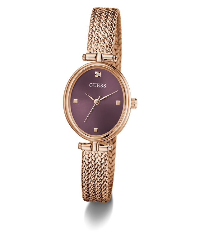 GUESS Ladies Rose Gold Tone Analog Watch with a purple face on a white background