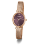 GUESS Ladies Rose Gold Tone Analog Watch with a purple face on a white background