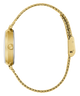 Side of GUESS Ladies Gold Tone Analog Watch with a chain strap on a white background