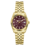 Gold-tone Guess women's watch with a fluted bezel, gold-tone link bracelet, and a deep burgundy dial with diamond hour markers and a date window.