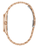 Side of GUESS Ladies Rose Gold Tone Multi-function Date Watch with a detailed band on a white background