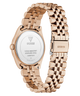 Caseback of GUESS Ladies Rose Gold Tone Multi-function Date Watch with metal band on a white background