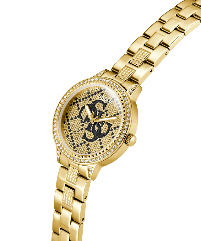 Gold watch with a decorative face on a white background lifestyle