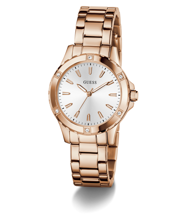 GUESS Ladies Rose Gold Tone Analog Watch with a white face on a white background
