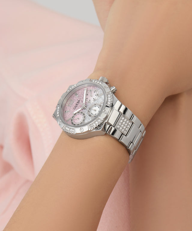 Silver watch GW0950L1 with a pink face on a wrist against a light background