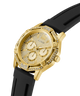Gold GUESS Mens Black Gold Tone Multi-function Watch with black strap on a white background lifestyle