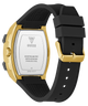 Guess watch with black strap and gold caseback on a white background