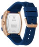 Guess watch with blue strap and rose gold caseback on white background