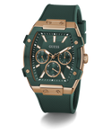 Green and rose gold watch with 'Guess' branding on a white background