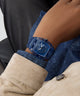 GUESS Mens Blue Analog Watch Blue watch on a wrist with a neutral background