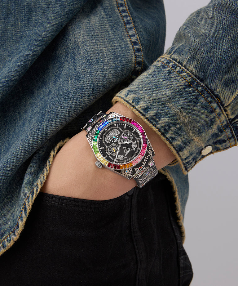 Person wearing a colorful Limited Edition Day Of The Dead watch with a denim jacket on a gray background