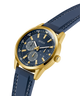 Watch with blue strap and gold case on a white background lifestyle
