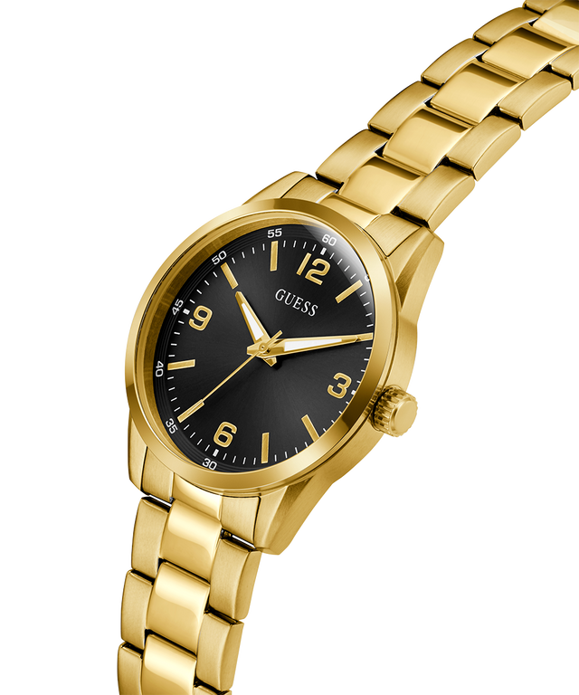 Gold watch with black dial on a white background lifestyle
