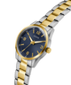 Two-tone silver and gold watch with blue dial on a white background lifestyle