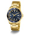 GUESS Mens Gold Tone Analog Watch with a blue dial on a white background