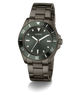 GUESS Mens Gunmetal Analog Watch with dark green face and metallic band on a white background