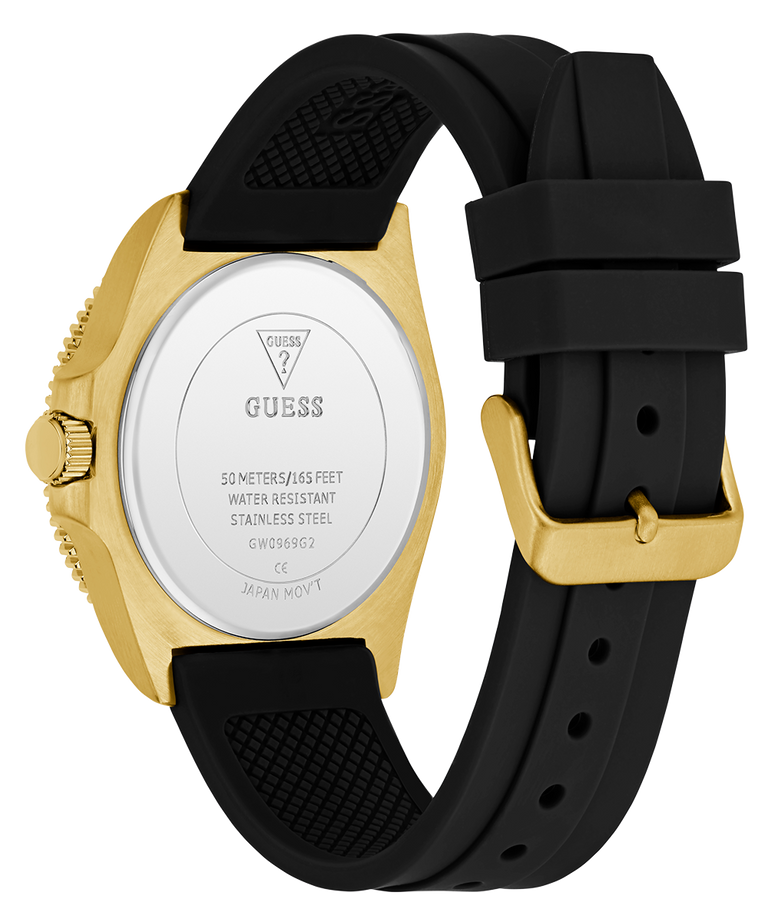 caseback of GUESS Mens Black Gold Tone Analog Watch with black strap and gold case on a white background