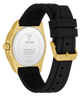 caseback of GUESS Mens Black Gold Tone Analog Watch with black strap and gold case on a white background