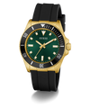 GUESS Mens Black Gold Tone Analog Watch with green dial, gold case, and black rubber strap on a white background