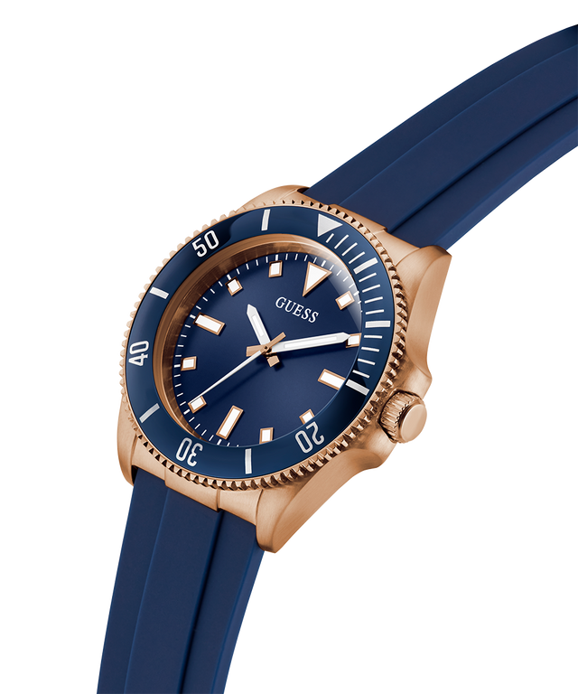Blue watch with rose gold case and blue strap on white background lifestyle