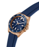 Blue watch with rose gold case and blue strap on white background lifestyle