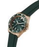 Green watch with rose gold case and green strap on white background lifestyle