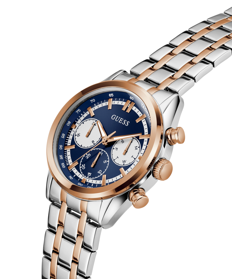 Two-tone GUESS Mens 2-Tone Multi-function Watch with blue dial and rose gold accents on a white background lifestyle