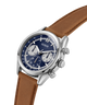 Watch with brown leather strap and blue dial on a white background lifestyle
