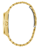 Gold watch with a beaded band on a white background