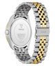 Two-toned silver and gold watch band with Guess branding on a white background
