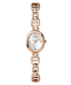 GUESS Ladies Rose Gold Tone Analog Watch with a white face on a white background