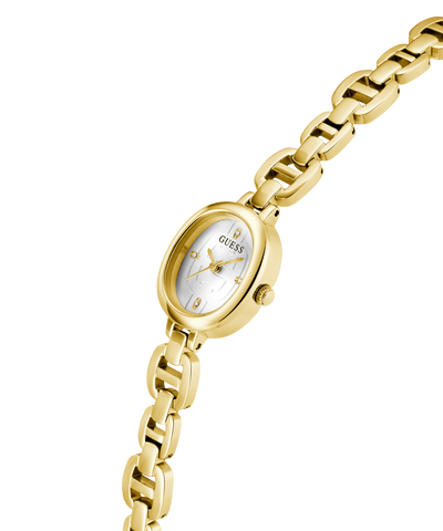 Gold watch with a white face on a white background lifestyle