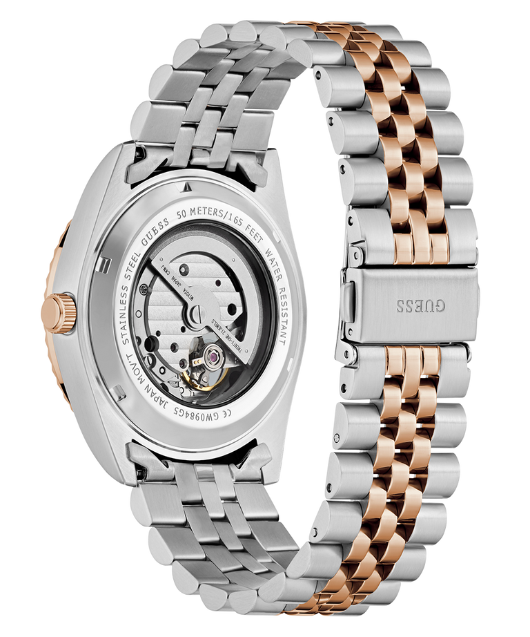 GUESS Mens 2-Tone Automatic Watch with detailed mechanism on a white background