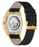 GUESS Mens Black Gold Tone Automatic Watch with black leather strap and gold caseback on a white background