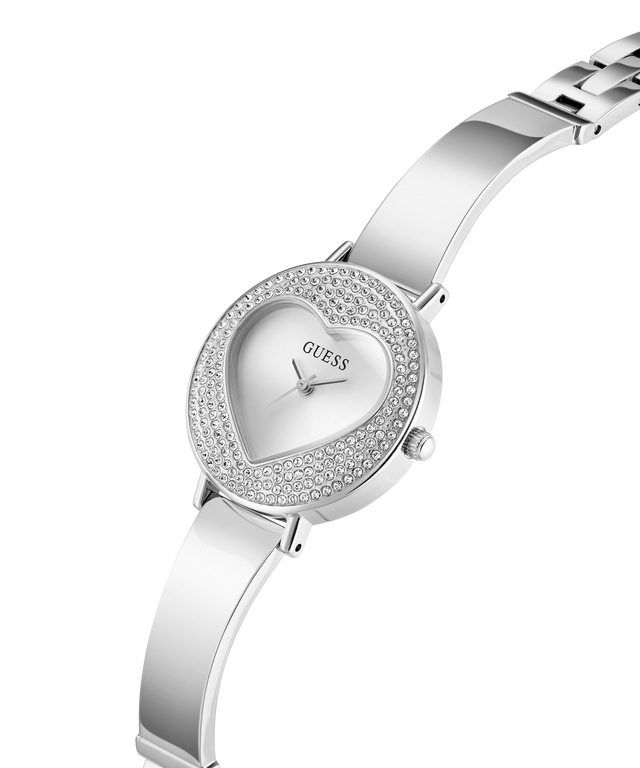 Silver watch with heart-shaped face and Guess logo on a white background lifestyle
