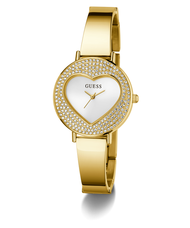 GUESS Ladies Gold Tone Analog Watch with heart-shaped face and Guess logo on a white background