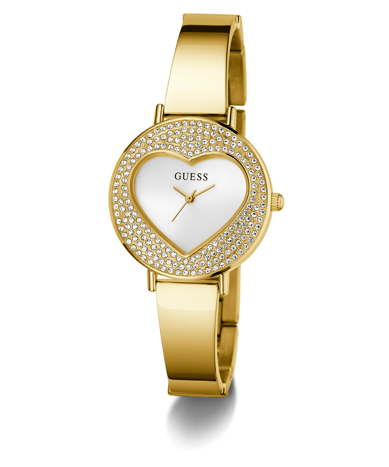 GUESS Ladies Gold Tone Analog Watch with heart-shaped face and Guess logo on a white background